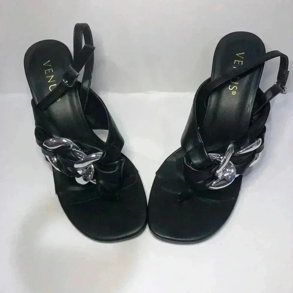 Black and silver heels size 7.5